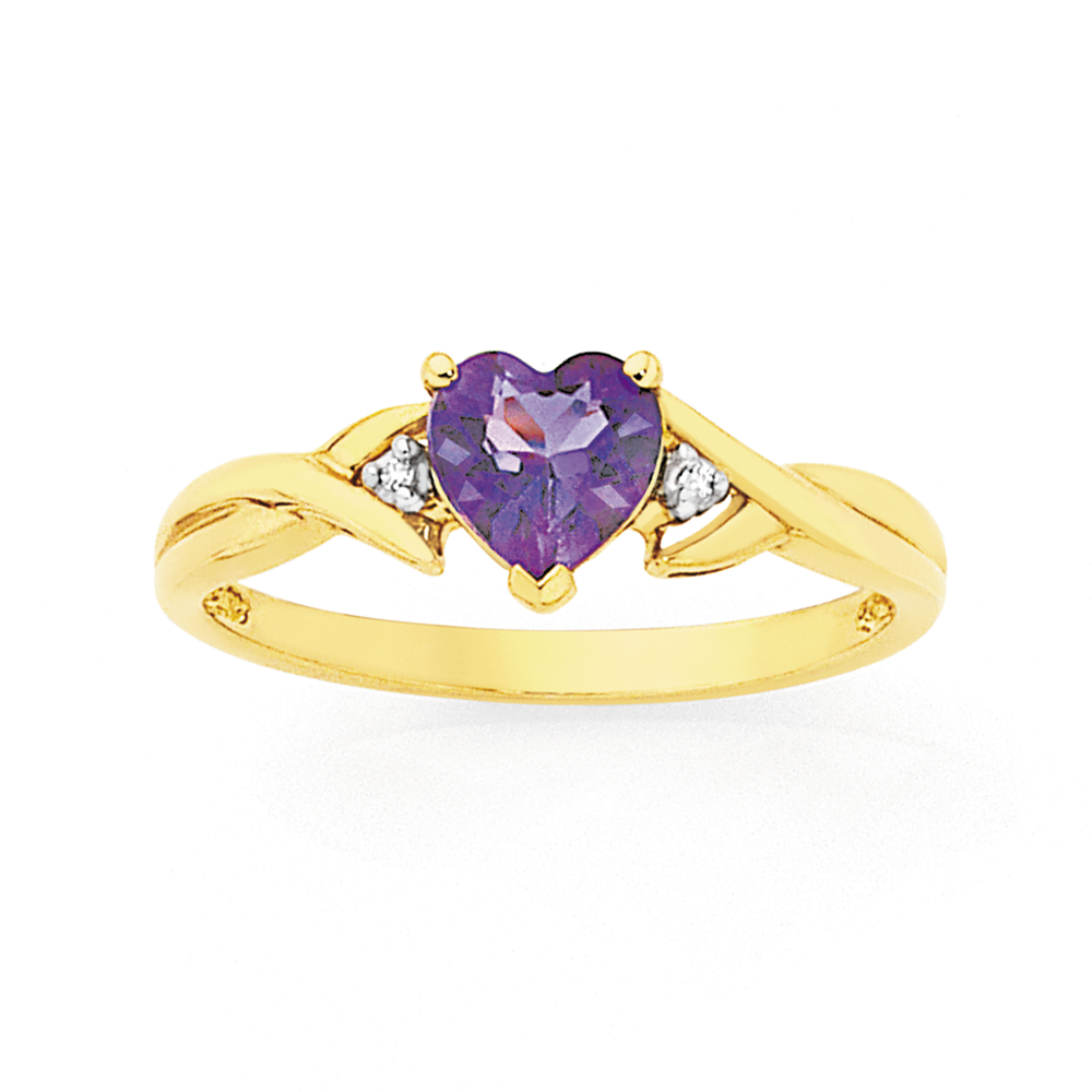 gold ring with purple diamond